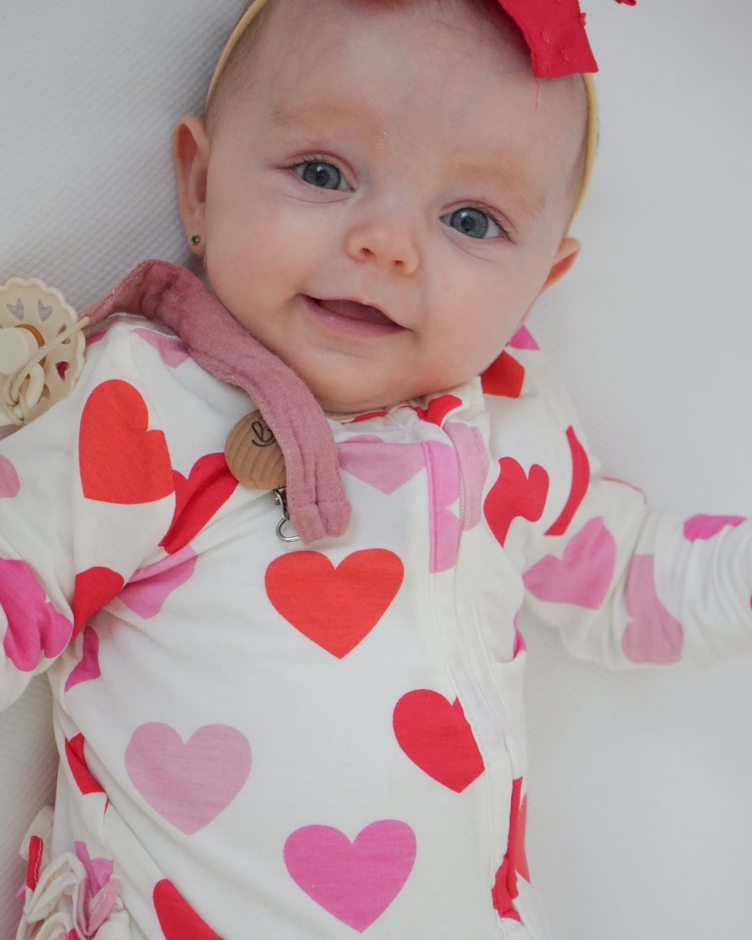 Hearts 2 Way Zipper Ruffle Back Footie